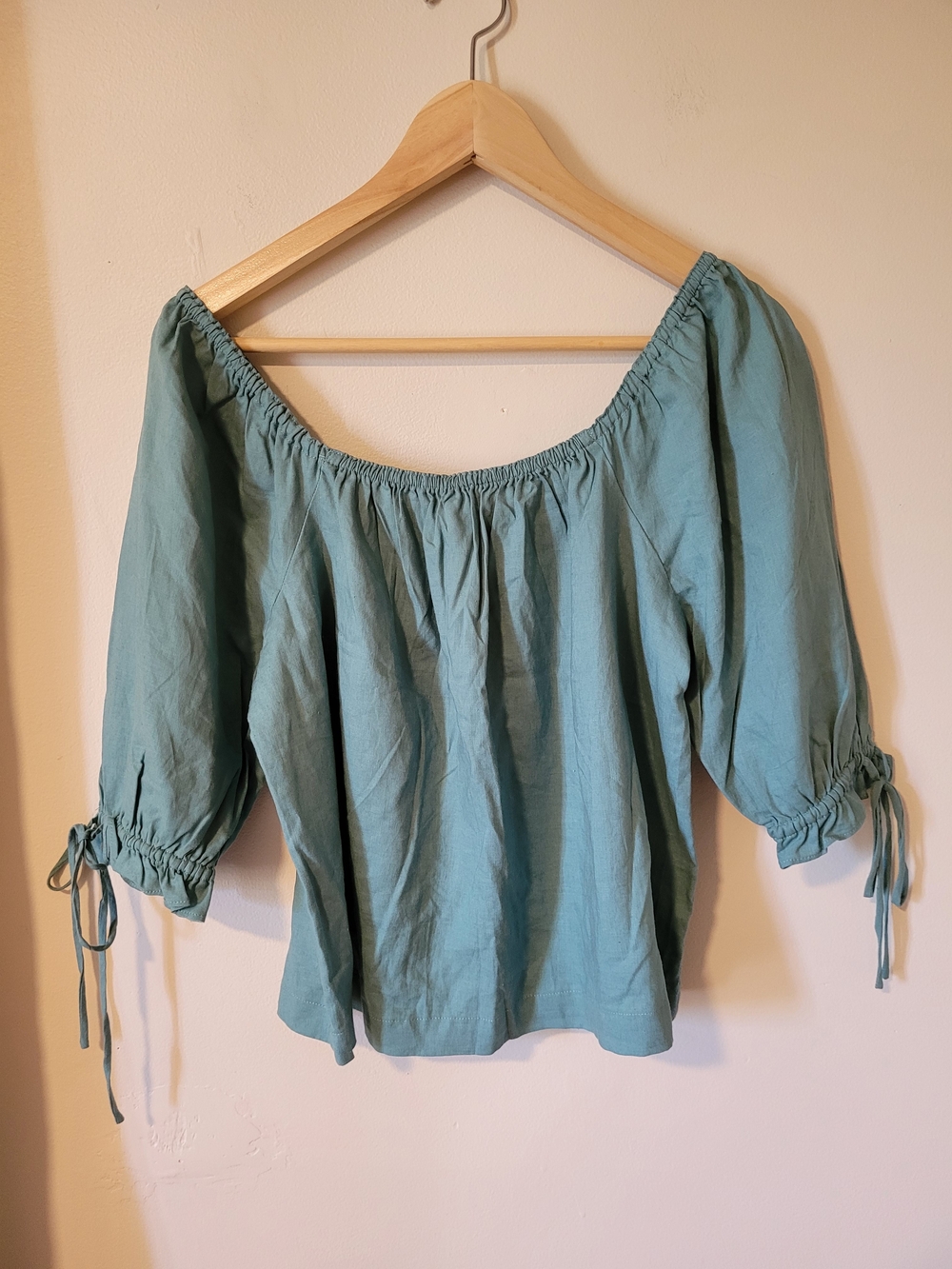 RW&CO. Teal Off-Shoulder Blouse with Tie Cuffs